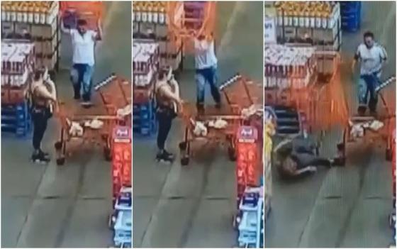 homem jogando carrinho de supermercado